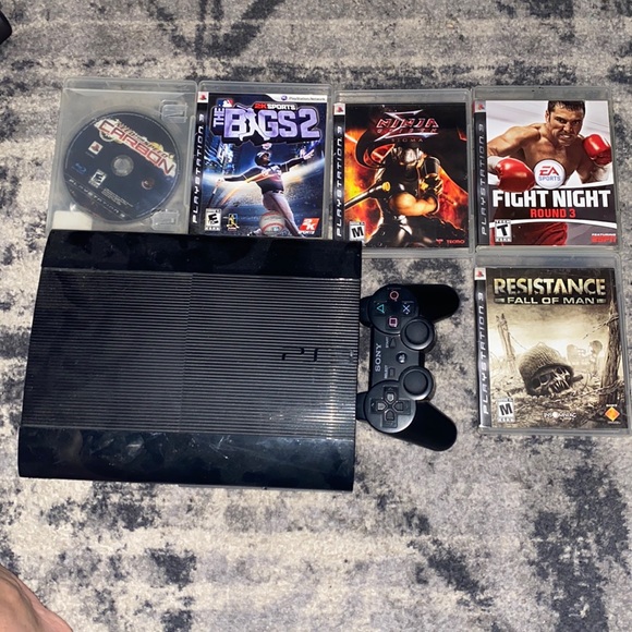 Am selling a ps3 with a controller and some games